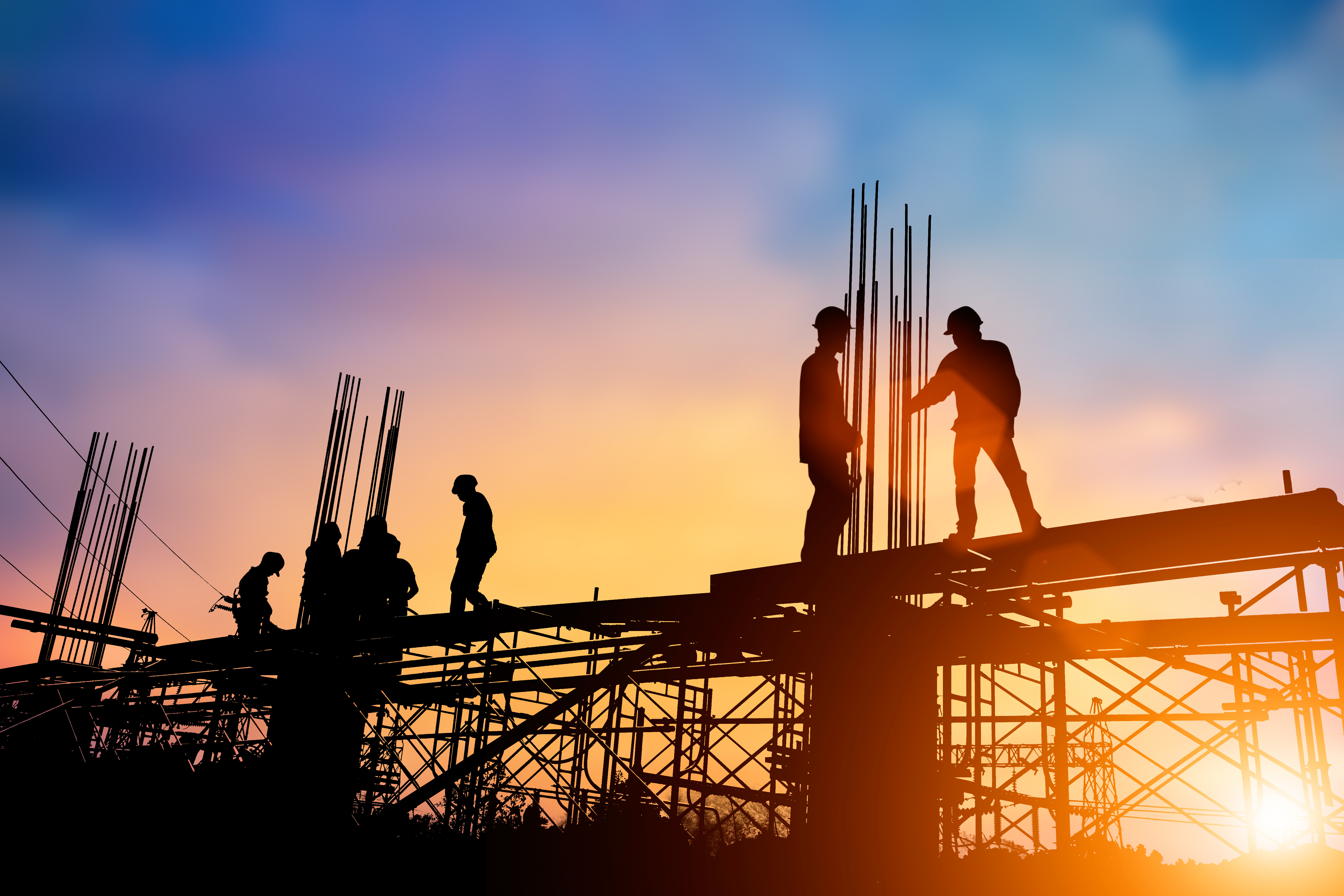 men working at industrial construction job site