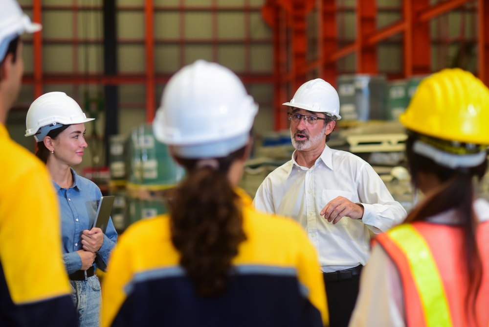 types of industrial engineers standing in a group talking