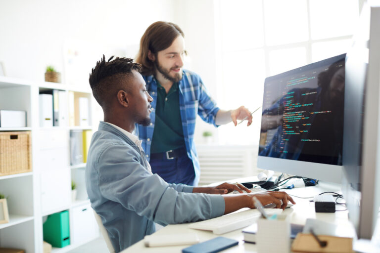 young engineers working together at a computer