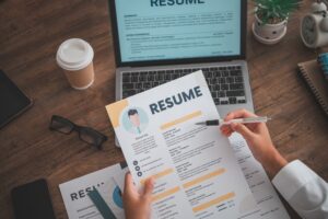 Hiring manager reviewing resumes
